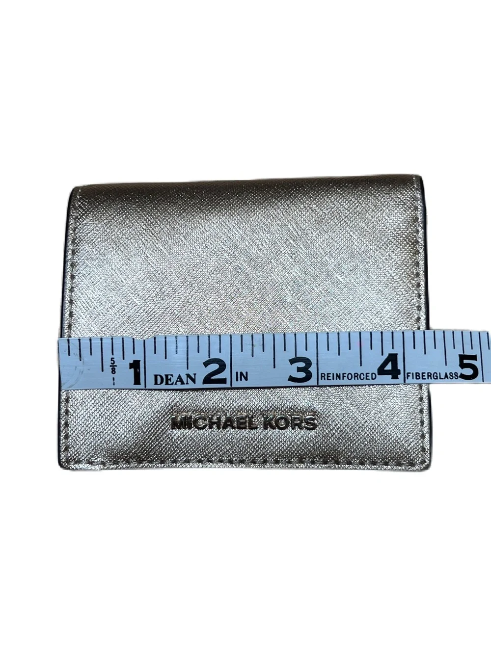 MICHAEL KORS Gold wallet in Saffiano Coated Leather.